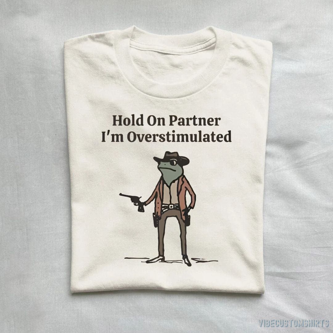 T-Shirt Natural / S Hold On Partner I'm Overstimulated Cowboy Frog T-Shirt