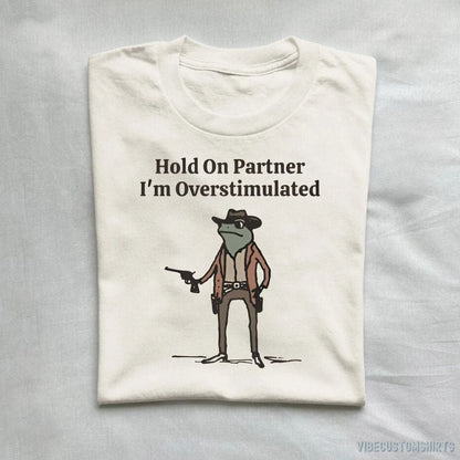 T-Shirt Natural / S Hold On Partner I'm Overstimulated Cowboy Frog T-Shirt